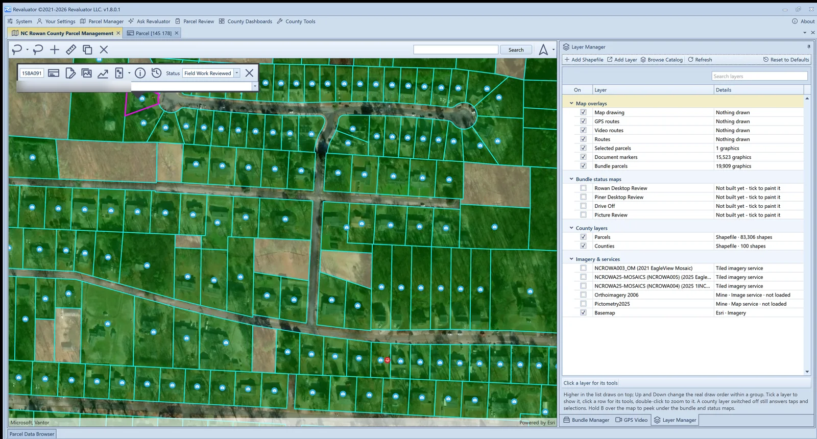 Layer Manager panel beside the parcel map: a single grid grouped into map overlays, bundle status maps, county layers and imagery and services, each row with an on switch and details such as graphic counts and service kinds.